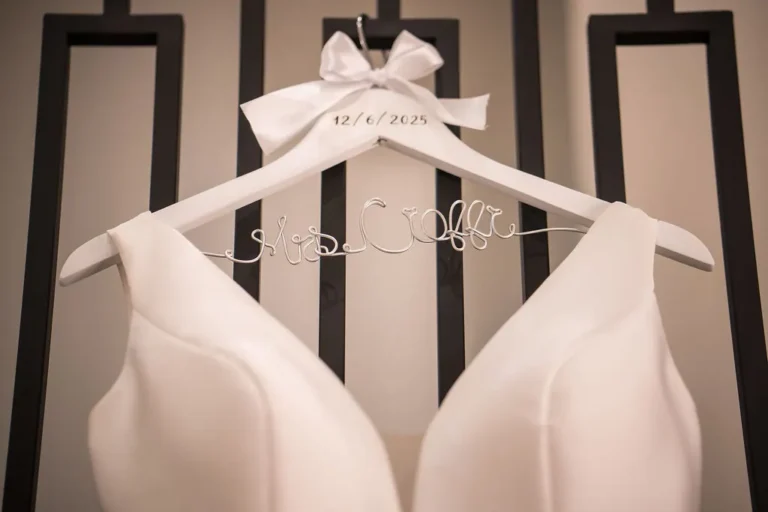 Maura’s wedding gown on a custom hanger