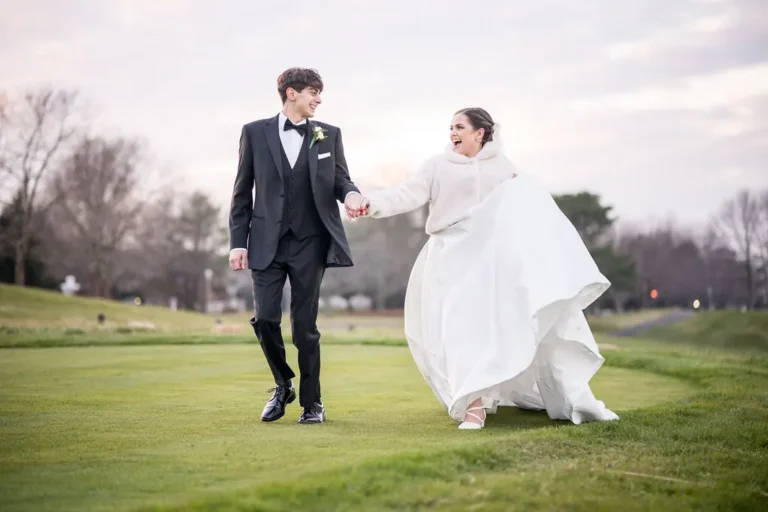 Maura and Christopher running across the Jumping Brook golf course