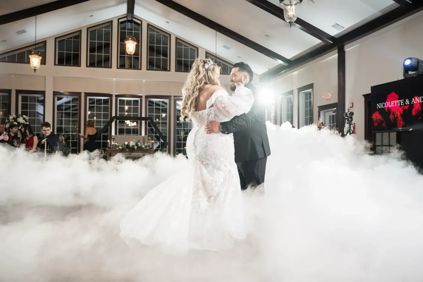 Couple sharing a first dance on FNA Dancing on the Clouds low fog