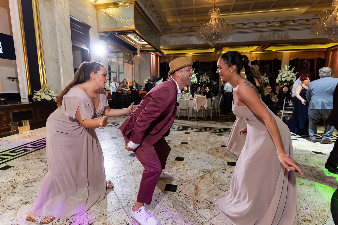 Wedding guests on the dance floor with a Fresh New Angle Events DJ